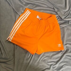 Adidas Vibrant Orange Shorts with White Stripes